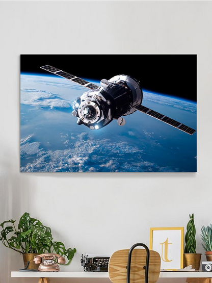 A Satellite Orbiting Earth Wrapped Canvas -Image by Shutterstock