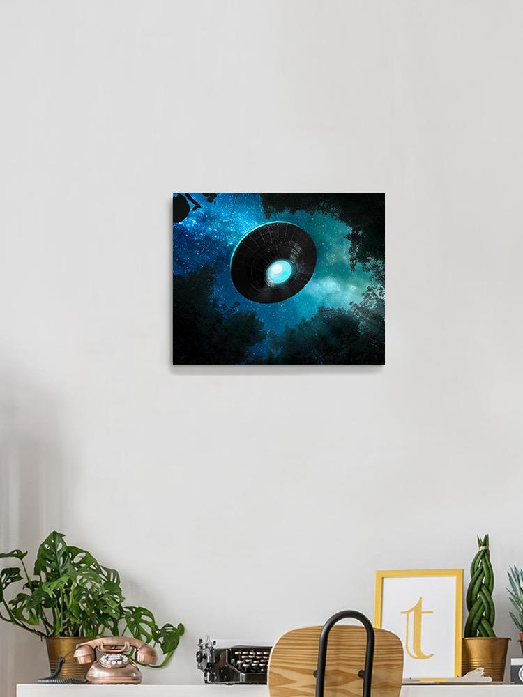 Alien Spaceship On A Forest Wrapped Canvas -Image by Shutterstock