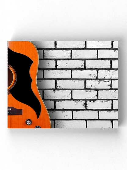 Acoustic Guitar On Wall Wrapped Canvas -Image by Shutterstock