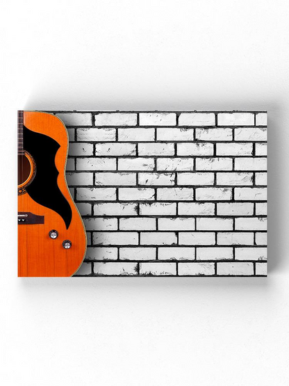 Acoustic Guitar On Wall Wrapped Canvas -Image by Shutterstock