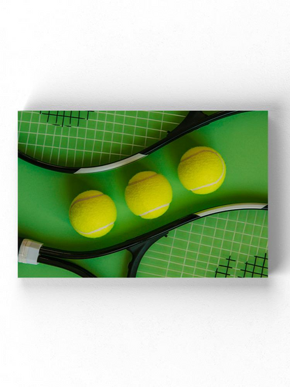 3 Tennis Balls And A Rackets Wrapped Canvas -Image by Shutterstock