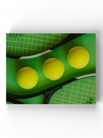 3 Tennis Balls And A Rackets Wrapped Canvas -Image by Shutterstock