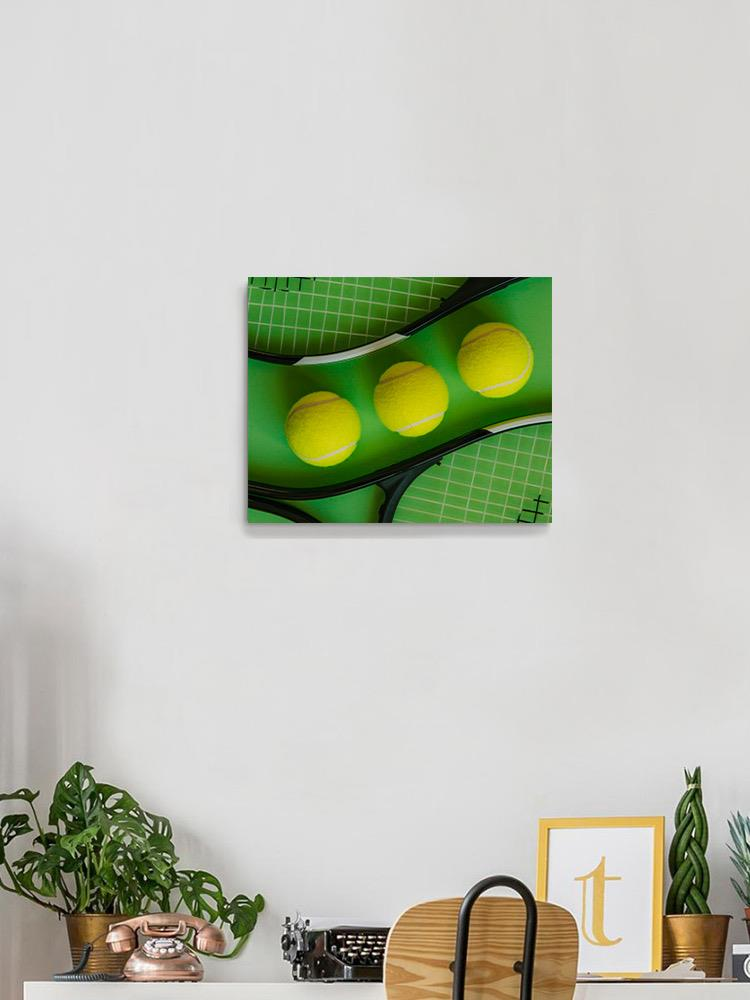 3 Tennis Balls And A Rackets Wrapped Canvas -Image by Shutterstock