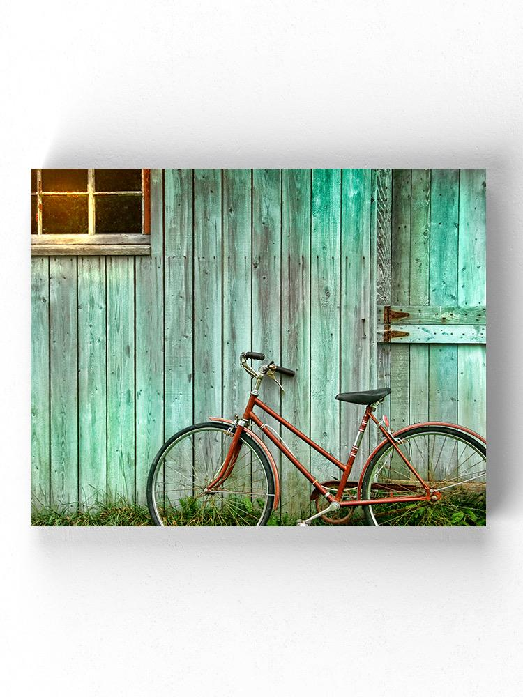 Bicycle Leaing Against A Wall Wrapped Canvas -Image by Shutterstock