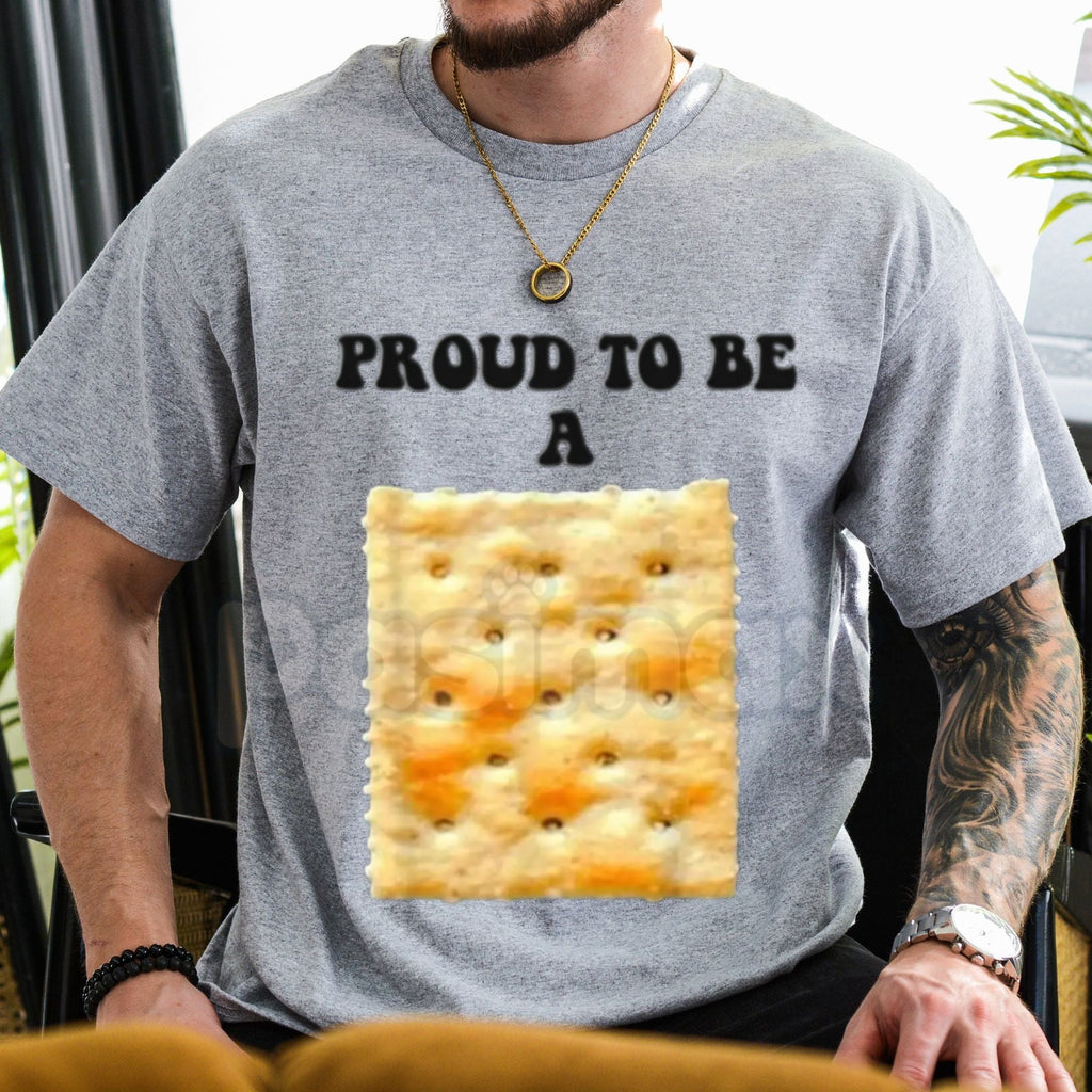 "Proud to Be a Cracker" Funny Holiday T-Shirt - Humorous Christmas Party Costume Tee, Premium 100% Cotton Sarcastic Pun Top, Witty Festive Nutcracker Style Shirt, Unique Holiday Gift for Him & Her, Soft Lived-In Heavyweight Casual Apparel