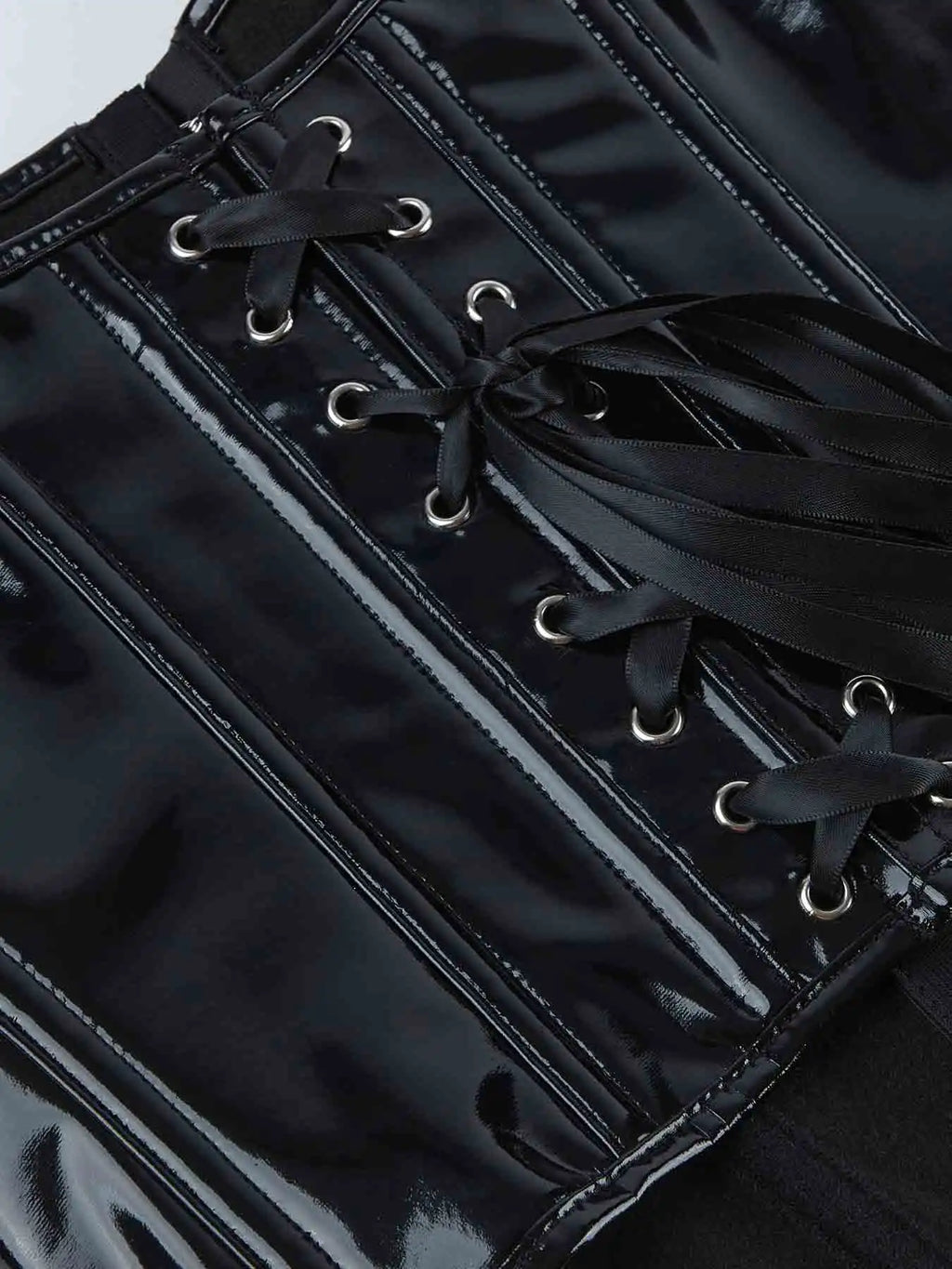 Corset with bright leather and breasted corset is fashionable and sexy. Wear a palace body-shaping coat outside the waist.