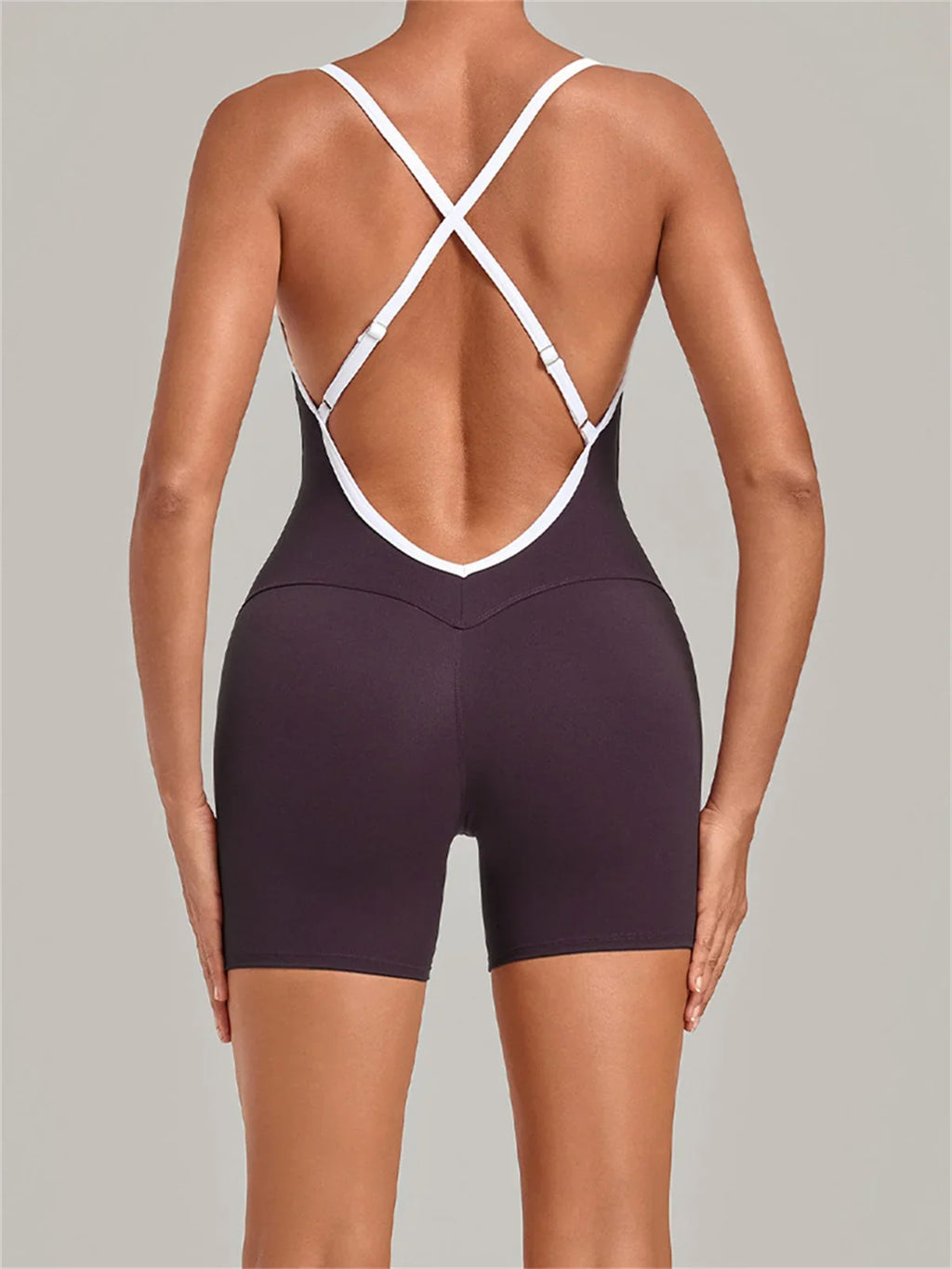 New Tight One-piece Yoga Suit Women Color Contrast Splicing Hollow Back Cross Sports Jumpsuit Outwear Slimming Fitness Bodysuits