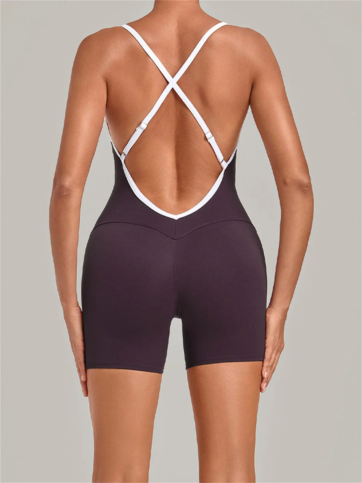 New Tight One-piece Yoga Suit Women Color Contrast Splicing Hollow Back Cross Sports Jumpsuit Outwear Slimming Fitness Bodysuits
