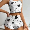 Heart Print Ribbed Frill Trim Pajama Set, Cute Bow Notched Neck Cross Strappy Backless Crop Cami Top & Elastic Shorts, Women's
