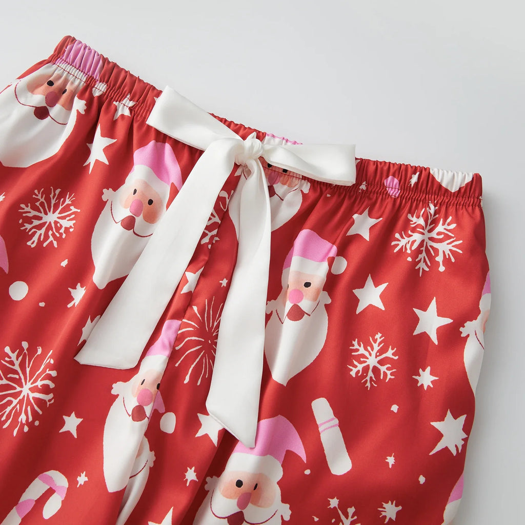 Women's 2025 Christmas Pajama Sets Fashionable Santa Printed Front Tie Ruffle Tops with Pants Two Pieces Soft Sleepwear