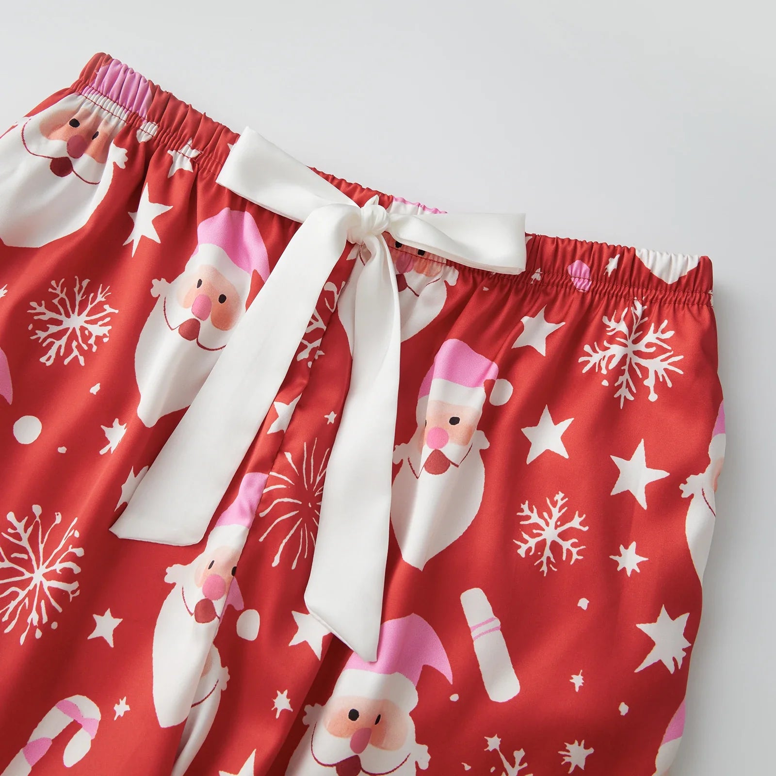 Women's 2025 Christmas Pajama Sets Fashionable Santa Printed Front Tie Ruffle Tops with Pants Two Pieces Soft Sleepwear