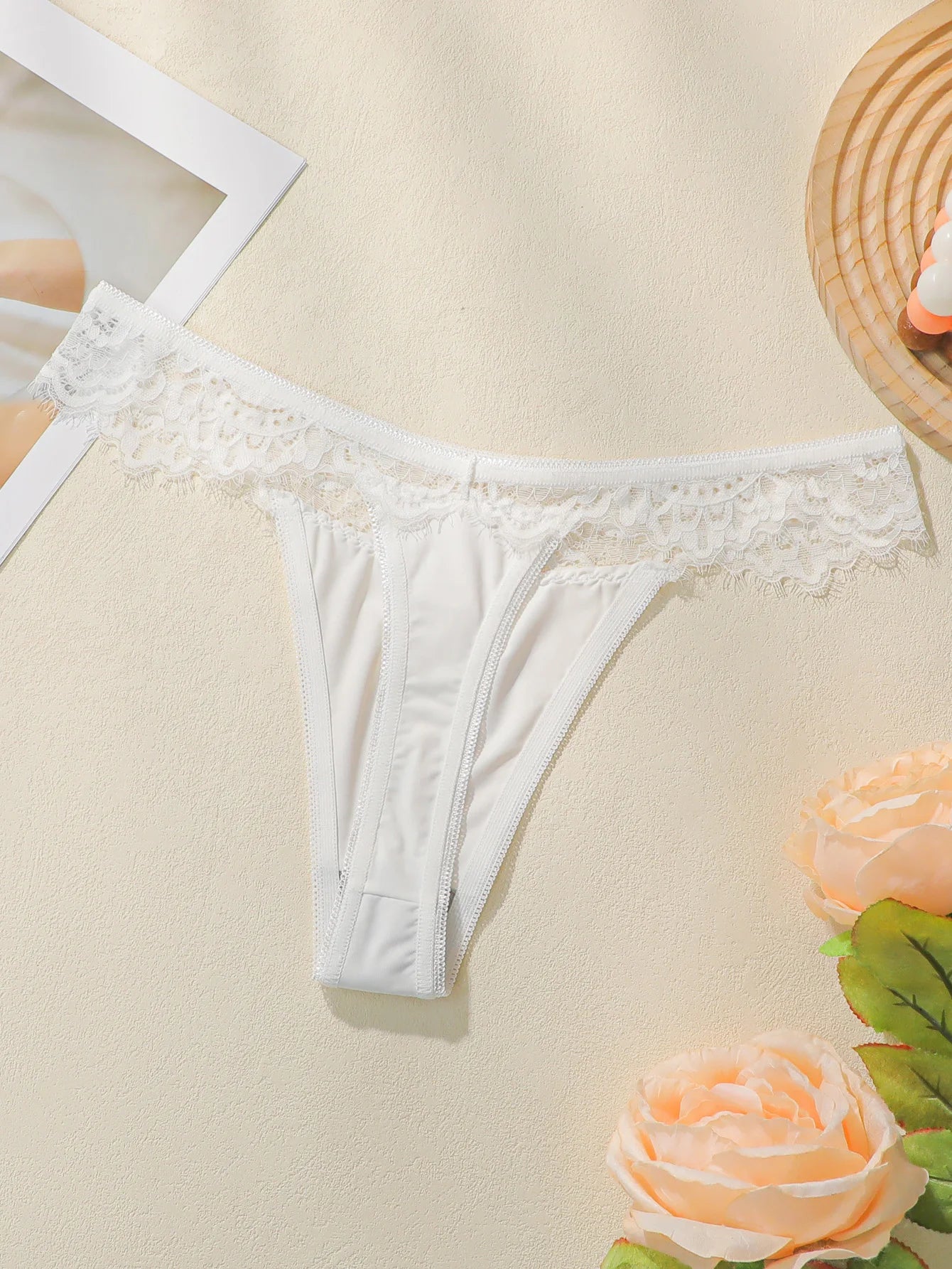 Women's low waisted lace thong with seamless hollow out lifting buttocks easy to wash and dry comfortable underwear C2324