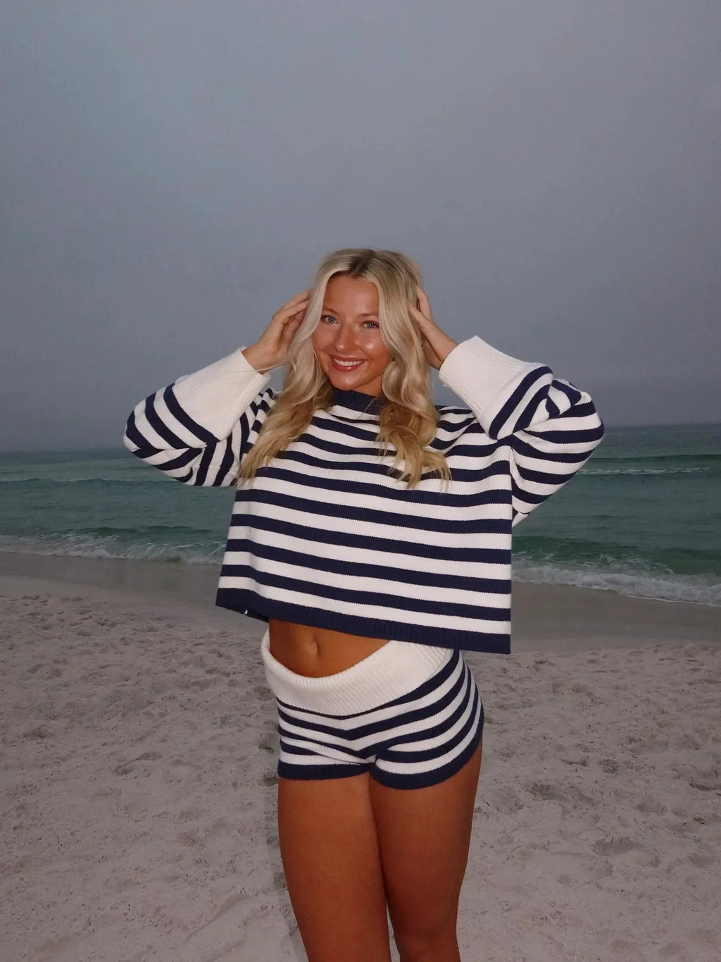 Women's spring suit 2026 European and American spring and summer women's fashionable lady solid color sweater short skirt suit