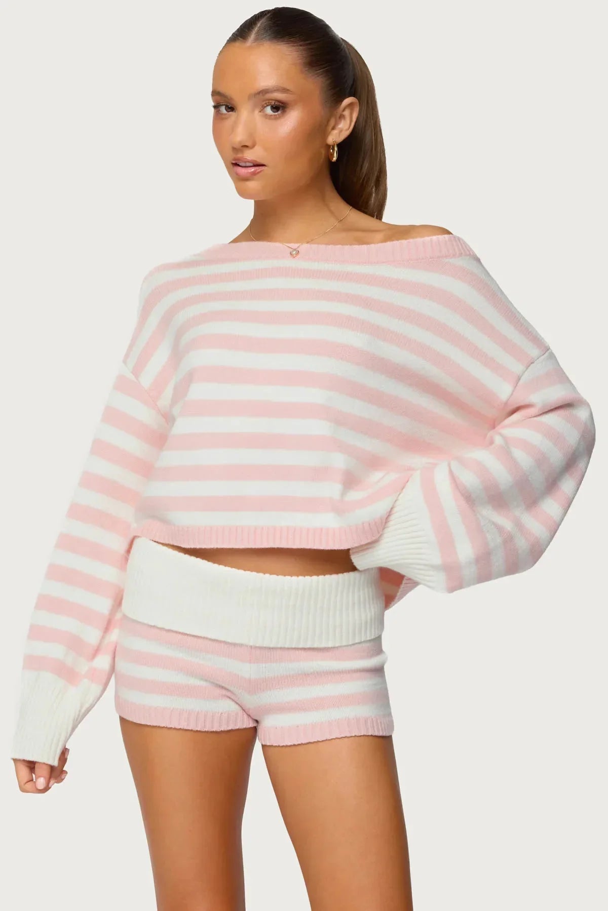 Women's spring suit 2026 European and American spring and summer women's fashionable lady solid color sweater short skirt suit