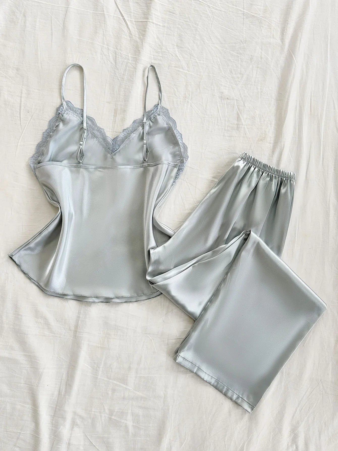 Two Piece Women's Pajamas Set with V Neck Lace Design Top Long Pants Fashionable And Comfortable For Spring And Summer Seasons