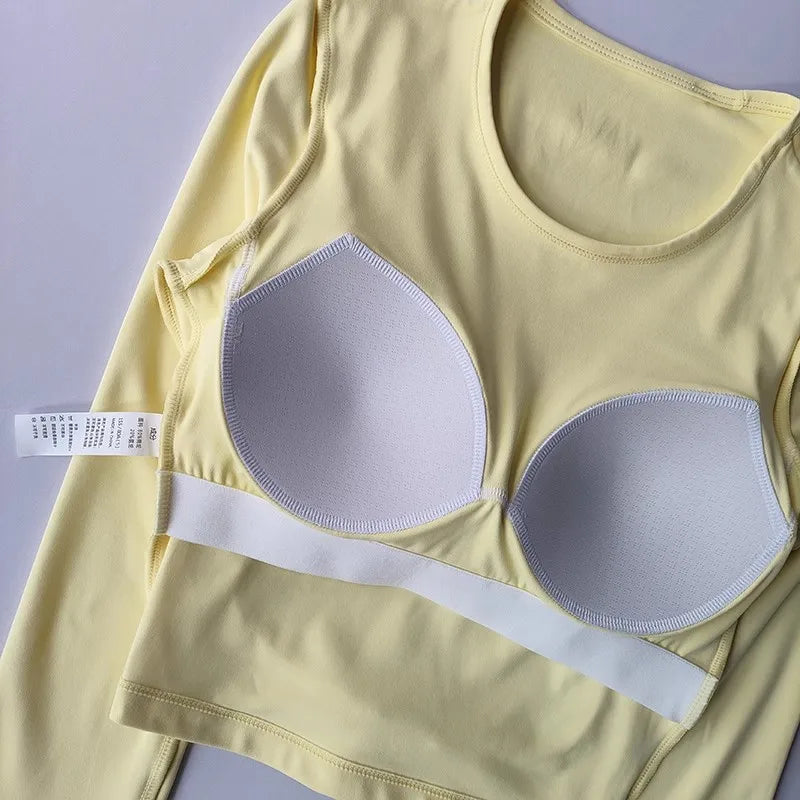 Women's long sleeved yoga suit sports top, high-end tight fitting hollow back fixed chest cushion