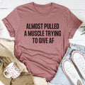 Relatable Effort Humor Crewneck Tee – "Almost Pulled A Muscle Trying To Give AF"