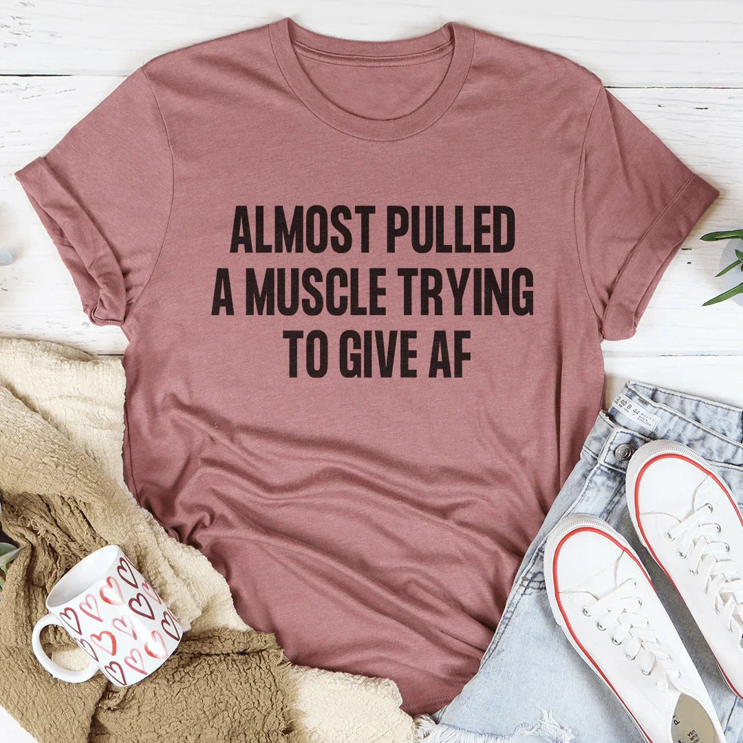 Relatable Effort Humor Crewneck Tee – "Almost Pulled A Muscle Trying To Give AF"