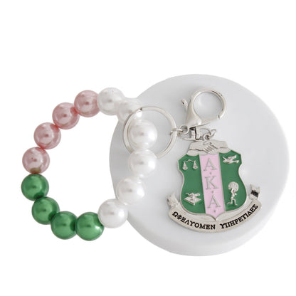 AKA Pink Green Pearl Shield Keychain