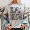 Dark Humor Graphic Tee – "I Hug People That I Hate"